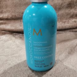 Moroccanoil Smoothing Lotion for frizz-prone hair in a 10.2 fl. oz.