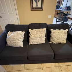 Couch in color dark gray