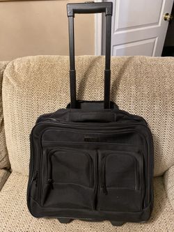Protege under seat carry on luggage