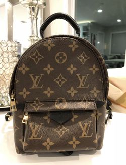 Luis Vuitton Palm Spring Mini Reverse Monogram W Pouch for Sale in  Dunwoody, GA - OfferUp