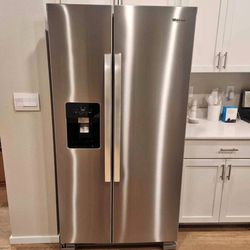 Whirlpool side by side refrigerator. Finger print resistant stainless steel finish.