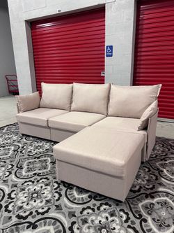 Cream Reversible Sectional Sofa w/ Ottoman. Excellent Condition. Can Deliver Pay After Delivery