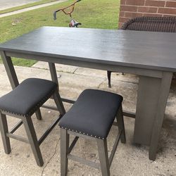 High table with 2 bars stood. 5feet long 30wide 30 tall