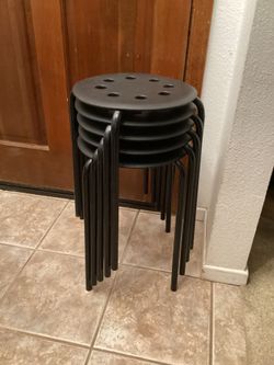 Five Black Plastic Bar Stools with Legs