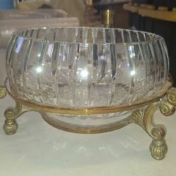 Crystal bowl in a brass rack with 3 candlestick holders. A113C001