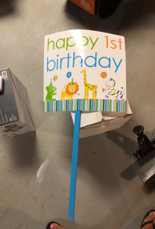 Happy first birthday sign from party city