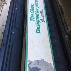 13 total random clubs and putters  Not Arnold Palmer but in box 