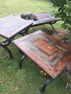 Three small little tables two corner tables and one coffee table