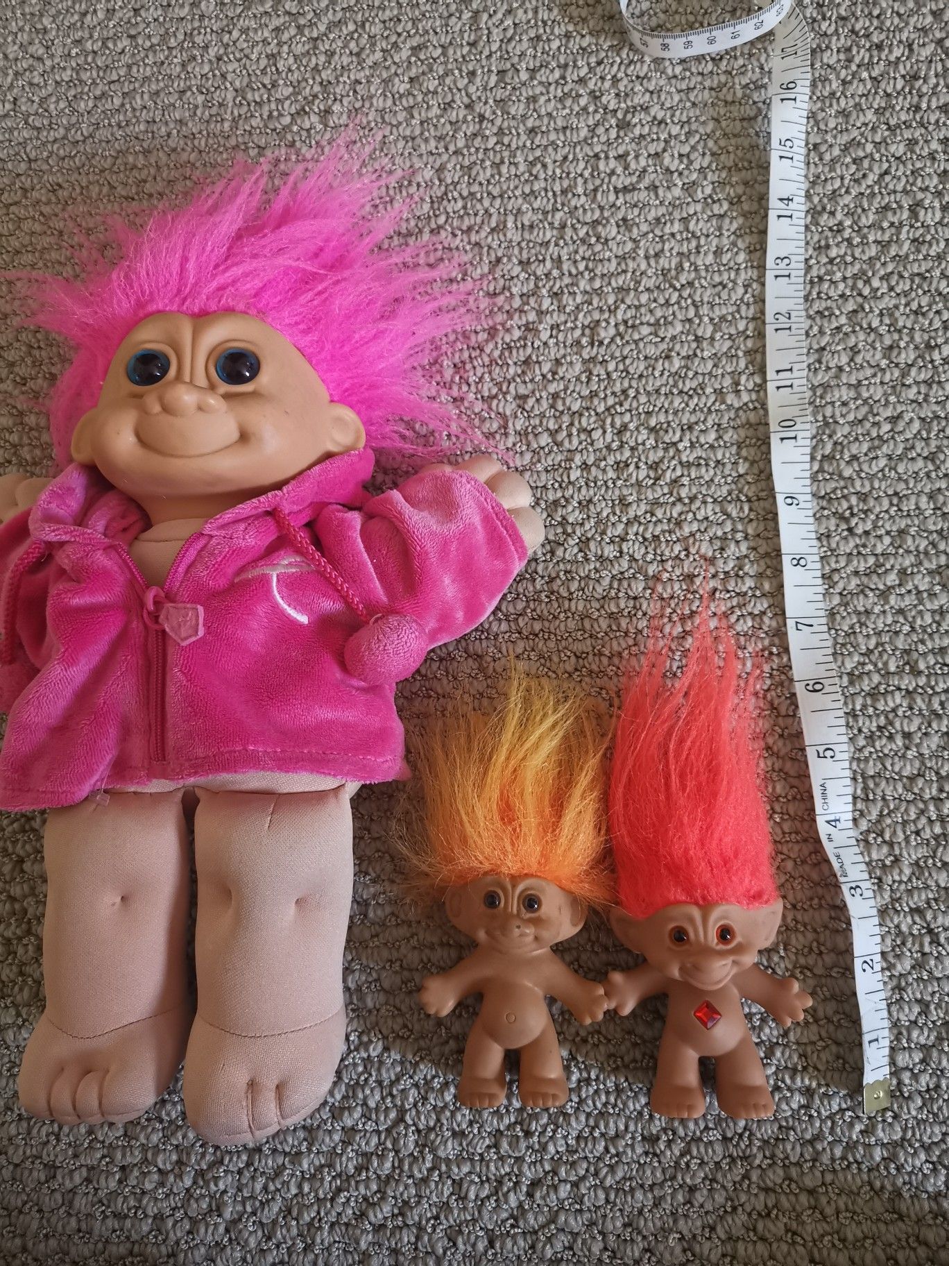 Three troll dolls 6 7 and 15"