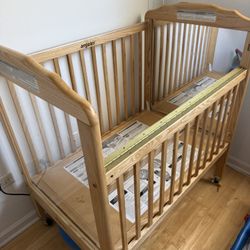 Angeles Child Craft Avery SafeAccess Compact Portable Crib  Mattress, ClearView Panels, Natural