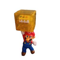 Super Mario Brothers action figure

4" tall approximately. Great shape. Normal wear. Has a yellow box on top of his head. 

Nintendo