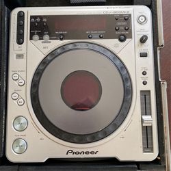 Two Cdj s with cases and mixers
