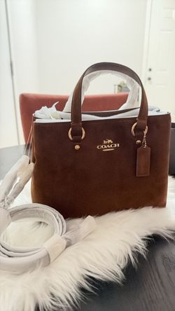 Coach bags and small wallets