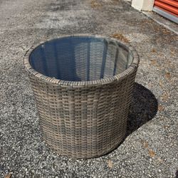 outdoor coffee table made of artificial rattan with tempered glass