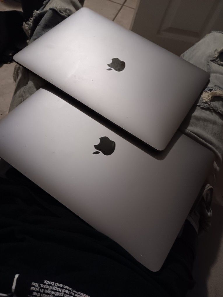 2 Brand New Apple  Mac Books 