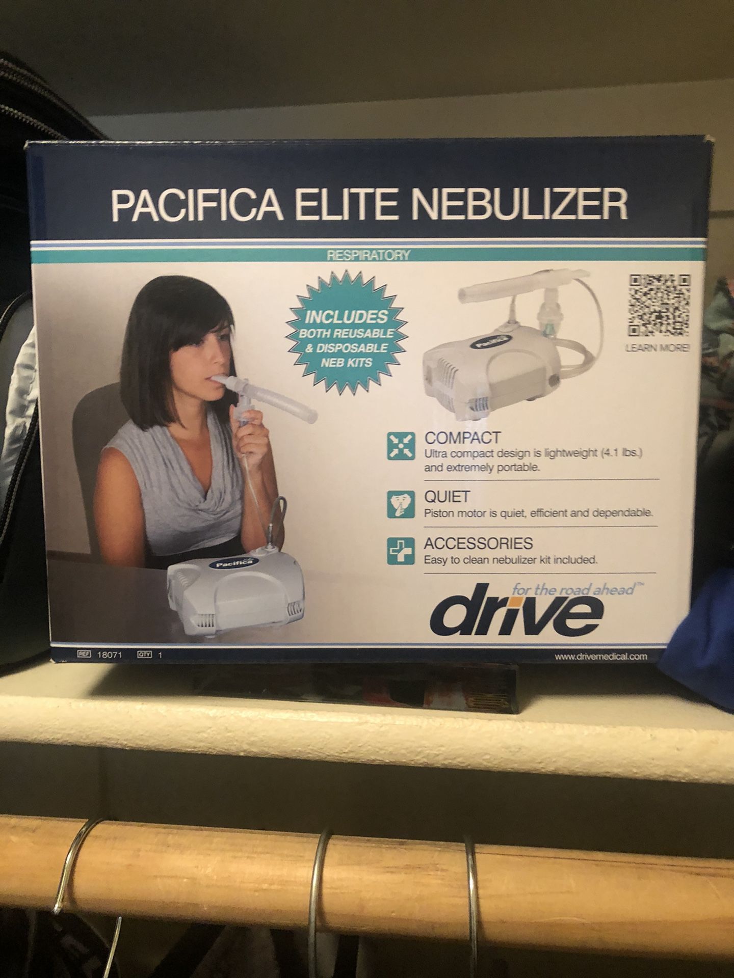 Breathing treatment machine nebulizer