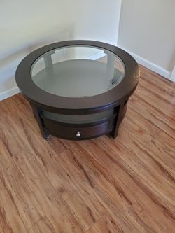 Round glass coffee table