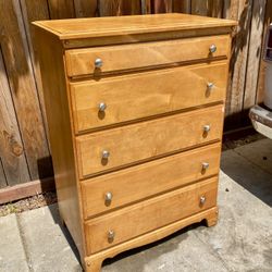 Five drawer dresser that also doubles as a hidden desk 45x19x32 Vintage Dresser Made Out Of Solid Maple. Very Solid, Beautiful Dresser $80.