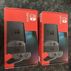 2 Nintendo Switches in Original Boxes