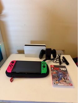 Nintendo Switch OLED Neon Joy-Cons + 8 Games + Dock + Charger