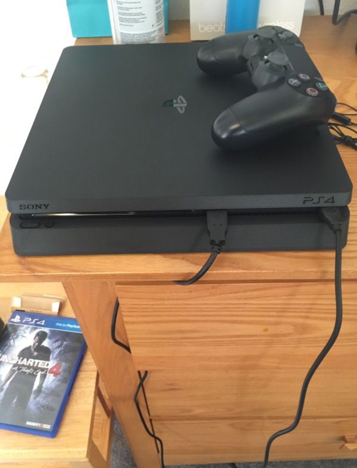 Ps4 slim with 2 controllers w/ 8 games