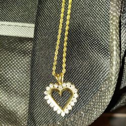 14k Diamond Heart Pendant And 14k Chain.