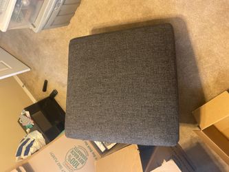 Brand new dark gray fabric ottoman