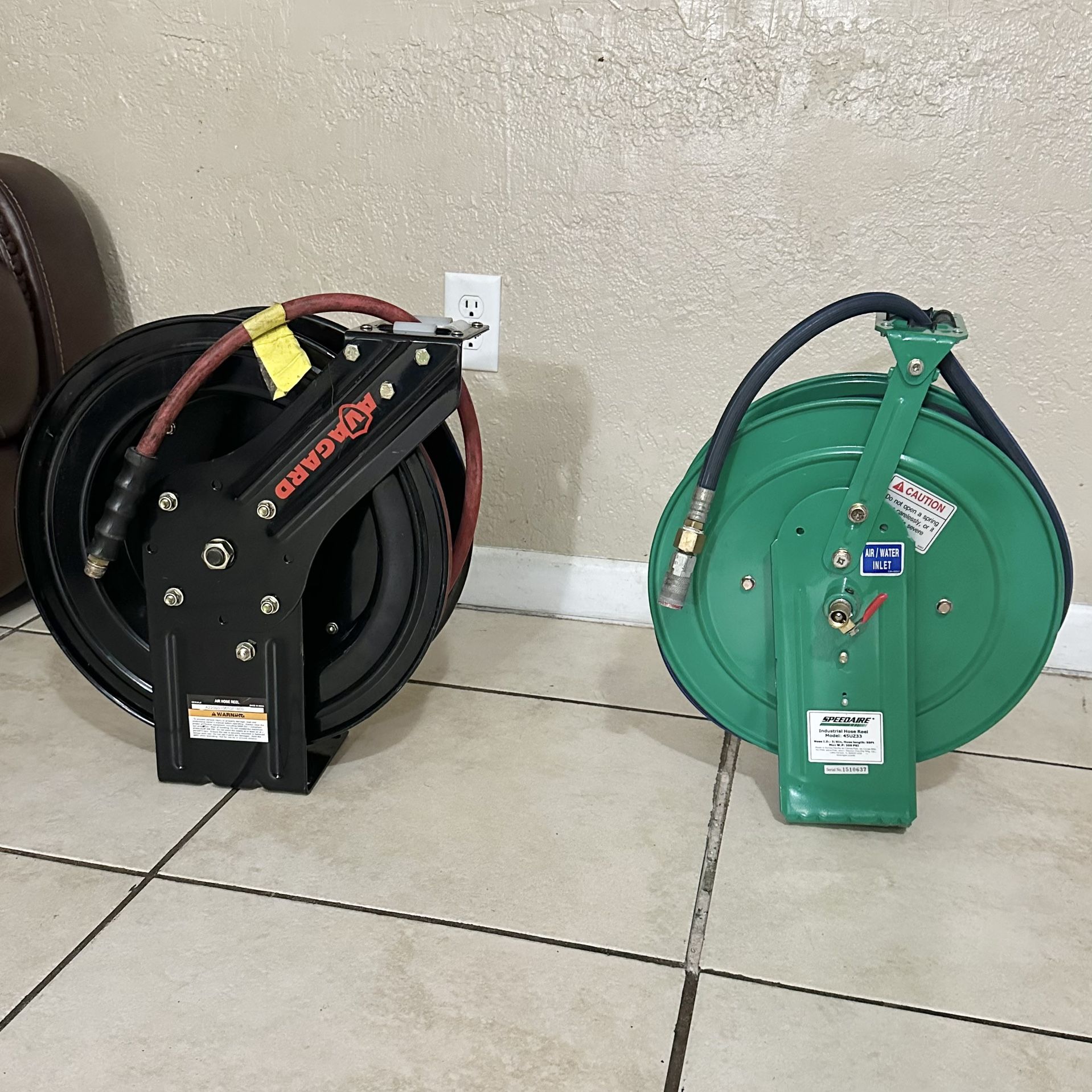 2 air compressor hose reels with hoses