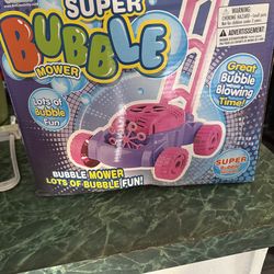 Bubble lawn mower new alittle damage box as you can see in picture located in Hesperia CA cash only