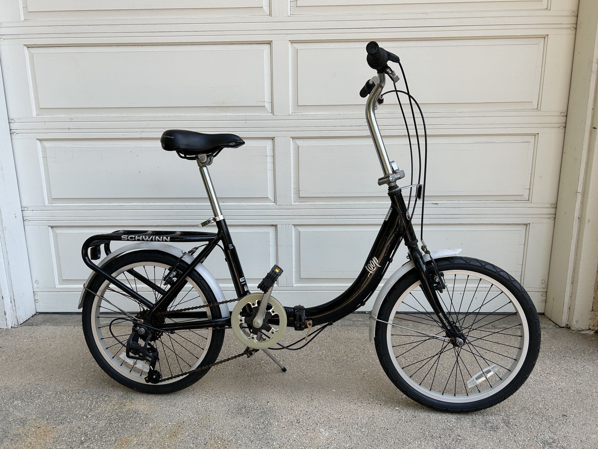 schwinn folding bicycle Loop Bike, 20 Inch Bike for Adults and Kids, 7 Speed, Lightweight Aluminum Folding Frame, Integrated Rear Carrier, Front and Rear Linear Pull Brakes, Foldable Bikes for Adults while double Schwinn loop,folding bicycle 7 speed