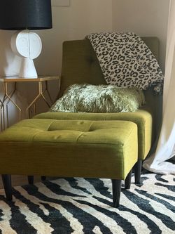 Olive green chair with seat ached stool for feet