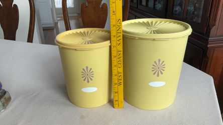 Two Vintage Sunburst Tupperware Conisters