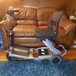 FREE RIDE LUGGIE FOLDING ELECTRIC WHEELCHAIR 