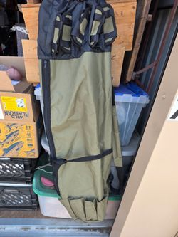 Large five holder fishing bag with extra pocket on the outside and shoulder strap..
