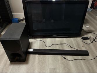 47 inch tv and soundbar and subwoofer with mount