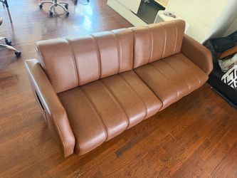 Brown faux leather futon