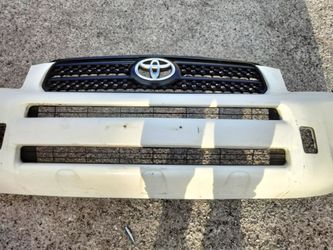 2006-2014 Toyota RAV4 complete front bumper with all the accessories OEM.