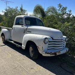 Vintage 1953 Chevrolet Truck with a Split Windshield.
