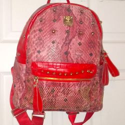 Pink And Red Studded Mcm Backpack
