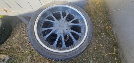24" rims with tires.