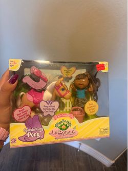 Cabbage patch doll and horse