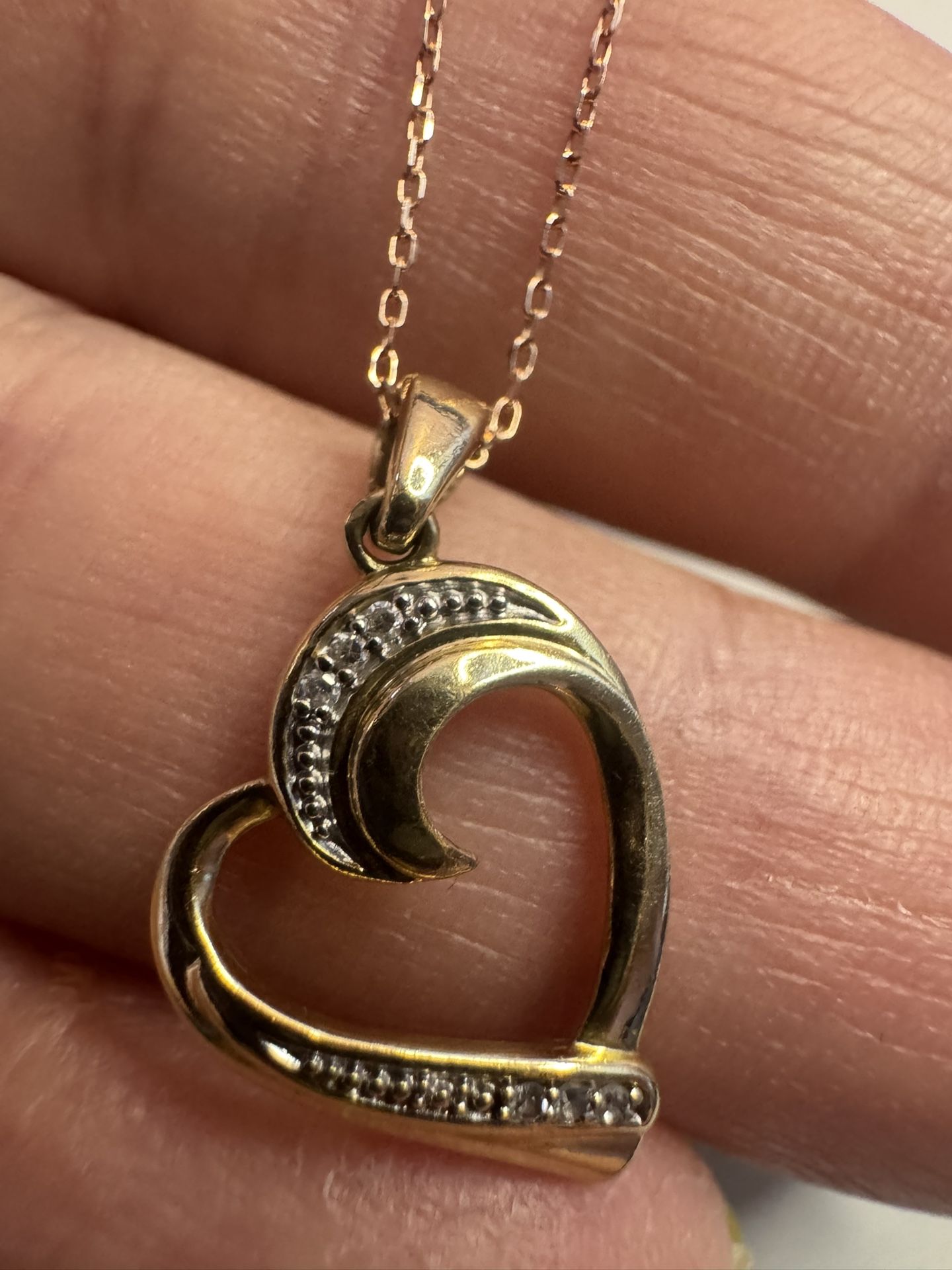 585 14k gold chain with 10k gold Diamonds heat pendant 