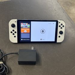 Nintendo Switch OLED w chwrger no dock station no trades pick up in Tacoma FIRM PRICE