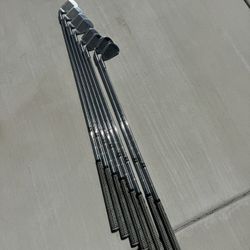 Golf Clubs And Titleist Bag