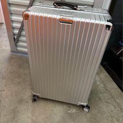 Brand New Rimowa luggage Large aluminum 