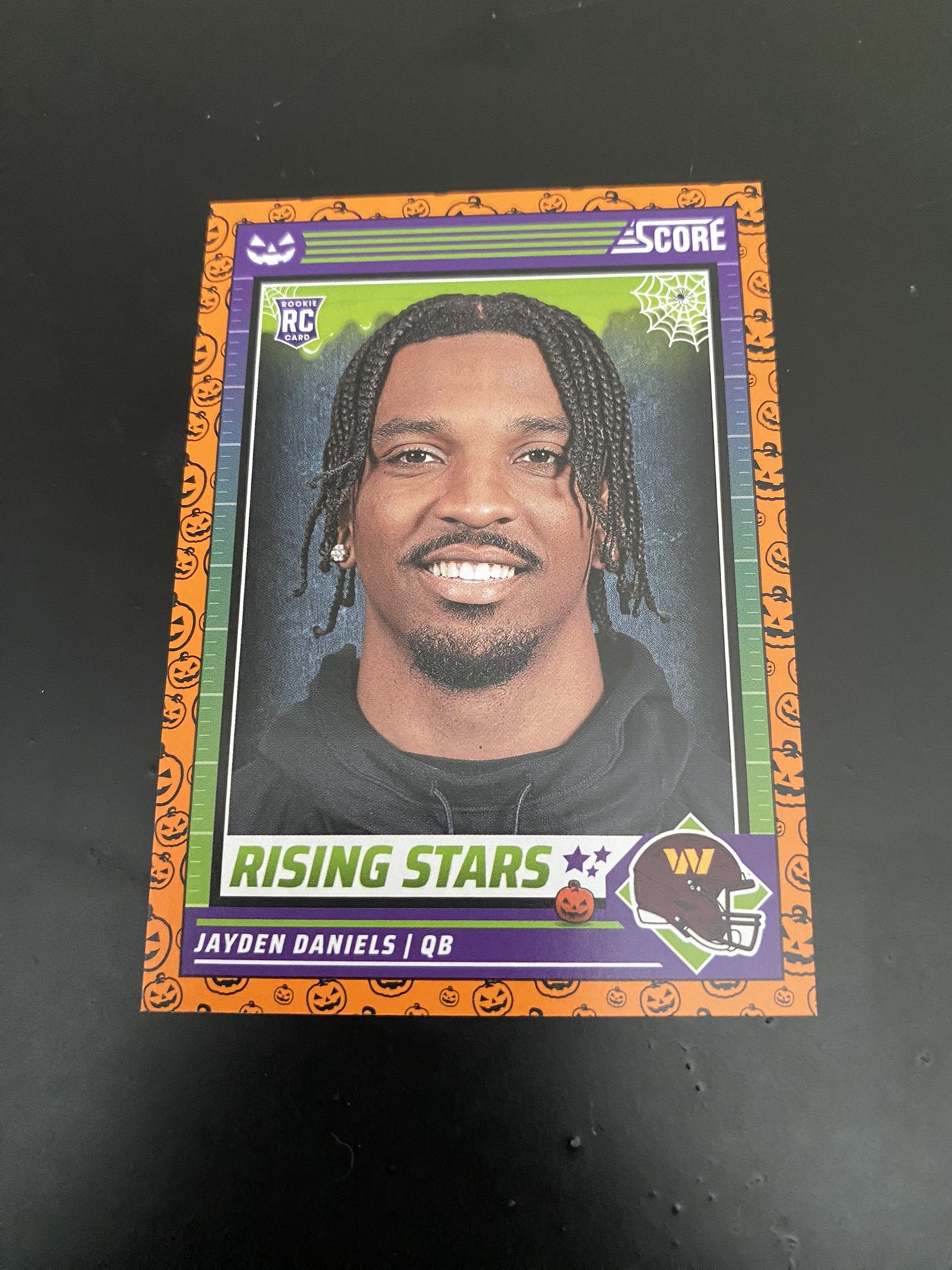 Jayden Daniels RC Score Or Treat Raw. Mint