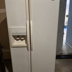 Whirlpool Side By Side Refrigerator.   
