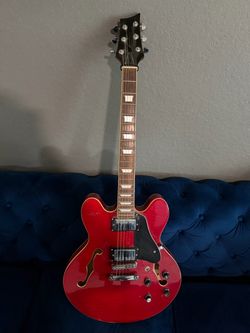 Vintage Red Electric Guitar