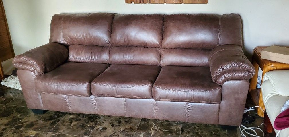 Leather Couch With Pull Out Bed. Brand New. Never Slept On.