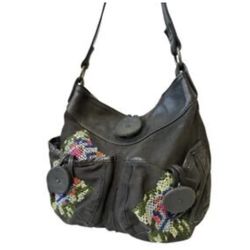 Nest France Black leather embroidered shoulder bag with multiple pockets and button closure #boho